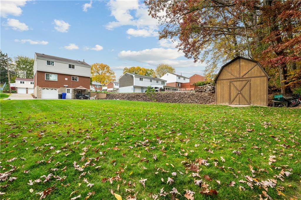 1027 Fiddleback Drive McKees Rocks, PA 15136 - Photo 22 of 25 a view of a garden
