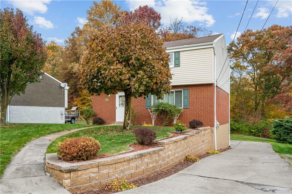 1027 Fiddleback Drive McKees Rocks, PA 15136 - Photo 25 of 25 a view of a house with a yard and tree s