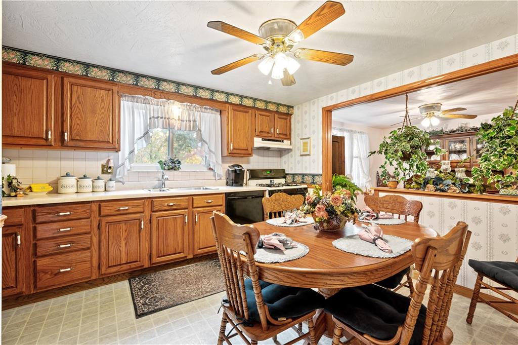 1027 Fiddleback Drive McKees Rocks, PA 15136 - Photo 3 of 25 a view of a dining room with furniture window and outside view