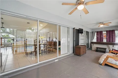 a room with lots of table and chairs