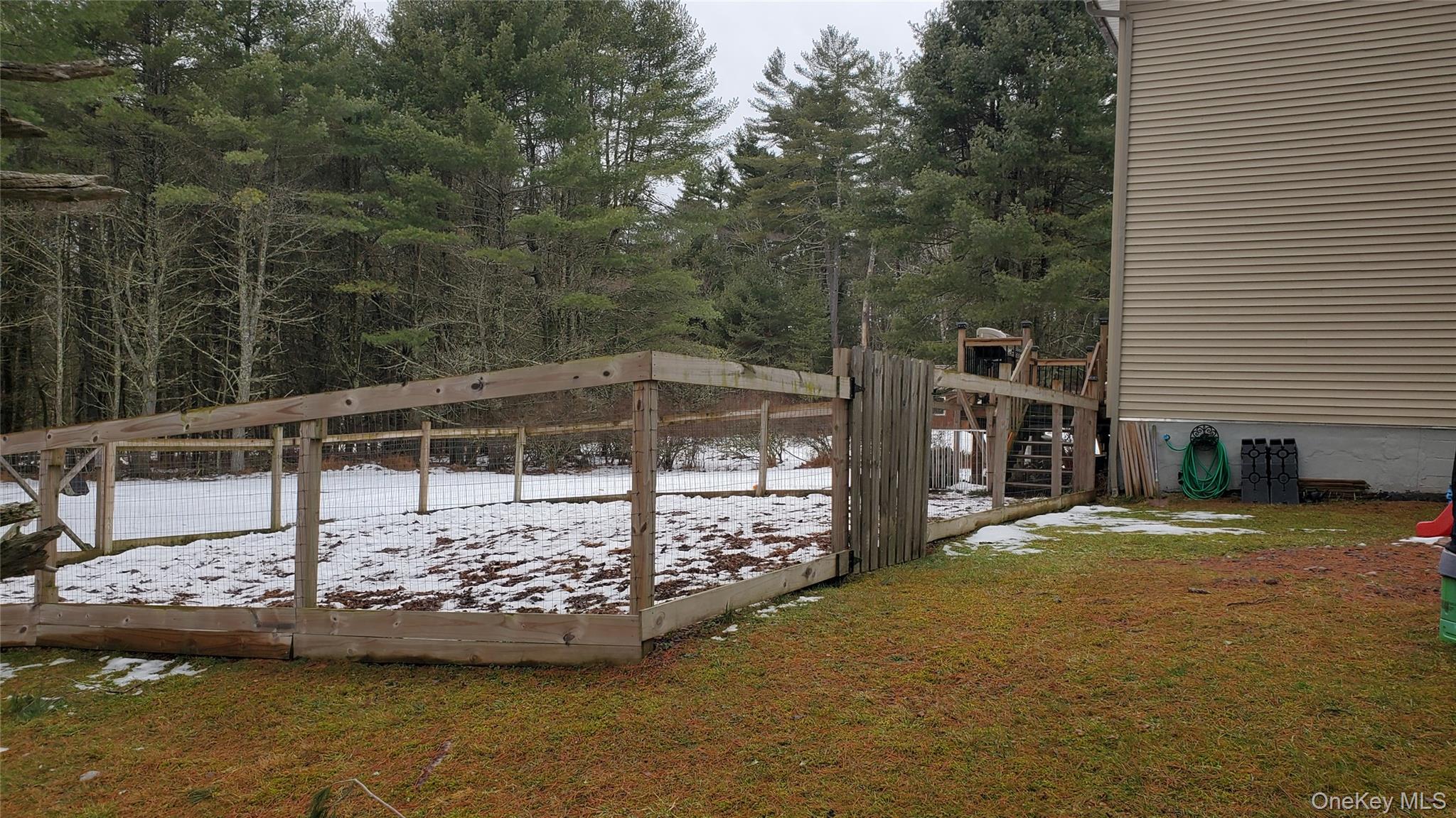 807 Beaver Brook Road Narrowsburg, NY 12764 - Photo 23 of 25 Yard layered in snow with a deck