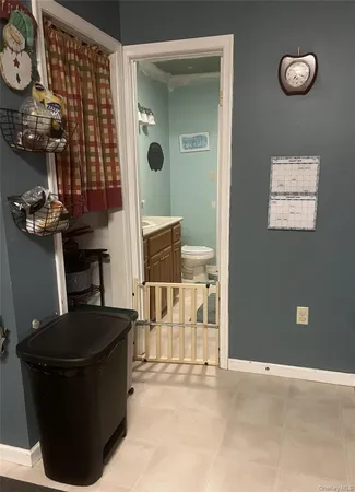 a view of a livingroom with furniture and chandelier
