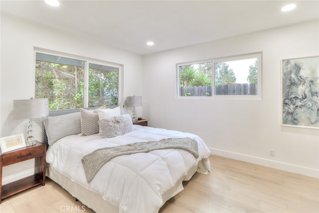 2225 Terraza Place Fullerton, CA 92835 - Photo 52 of 73 a bedroom with a bed and a window
