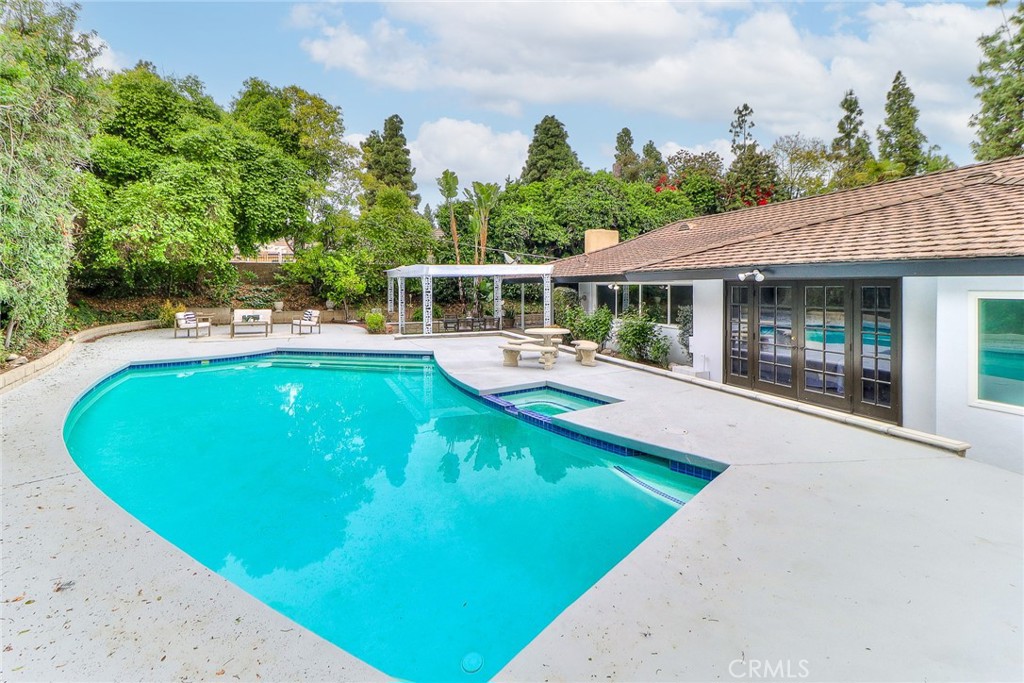2225 Terraza Place Fullerton, CA 92835 - Photo 69 of 73 a view of a swimming pool with lounge chair
