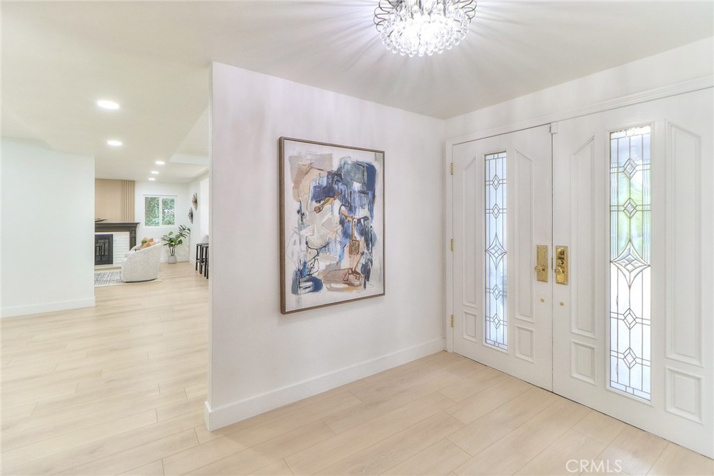 2225 Terraza Place Fullerton, CA 92835 - Photo 10 of 73 a view of a livingroom with a furniture wooden floor and a window