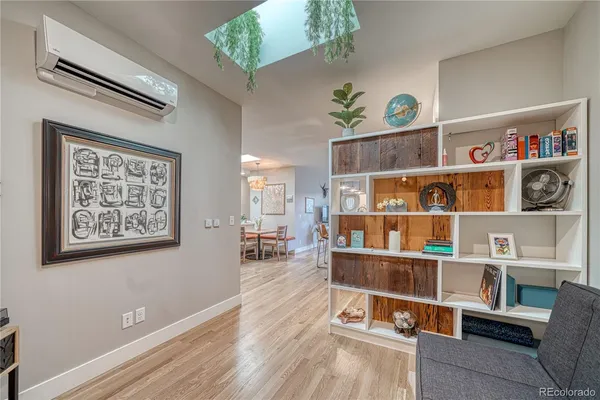a view of a workspace with furniture and toys