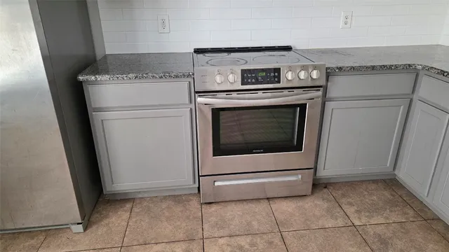 a utility room with washer and dryer