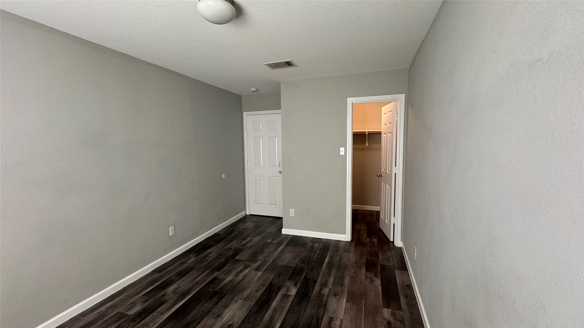 5605 Clyde Lane Austin, TX 78754 - Photo 18 of 26 a view of a room with wooden floor