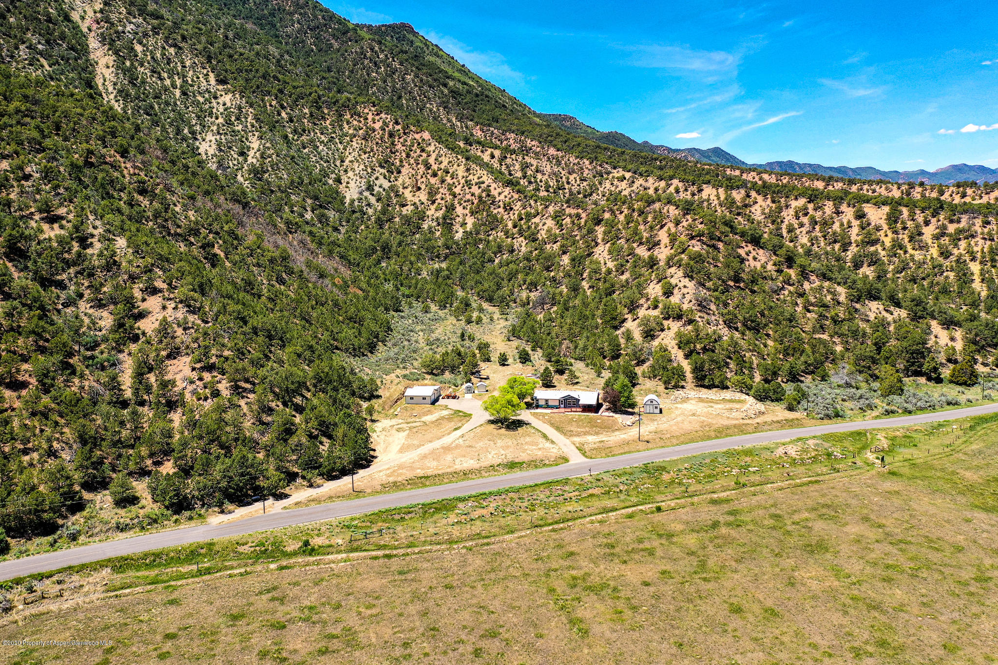 1205 County Road 252 Rifle, CO 81650 - Photo 31 of 37 a view of a yard with an outdoor space