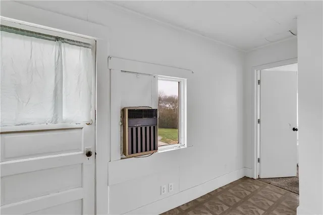 a view of livingroom with furniture and workspace