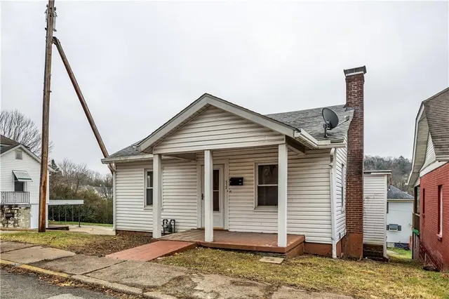 a house view with a roof deck