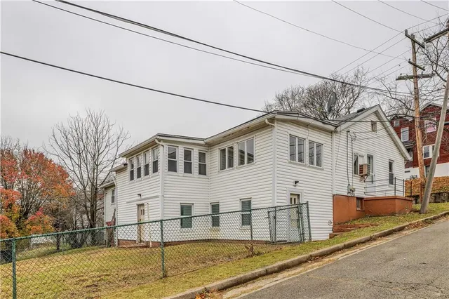a view of a hallway with couch