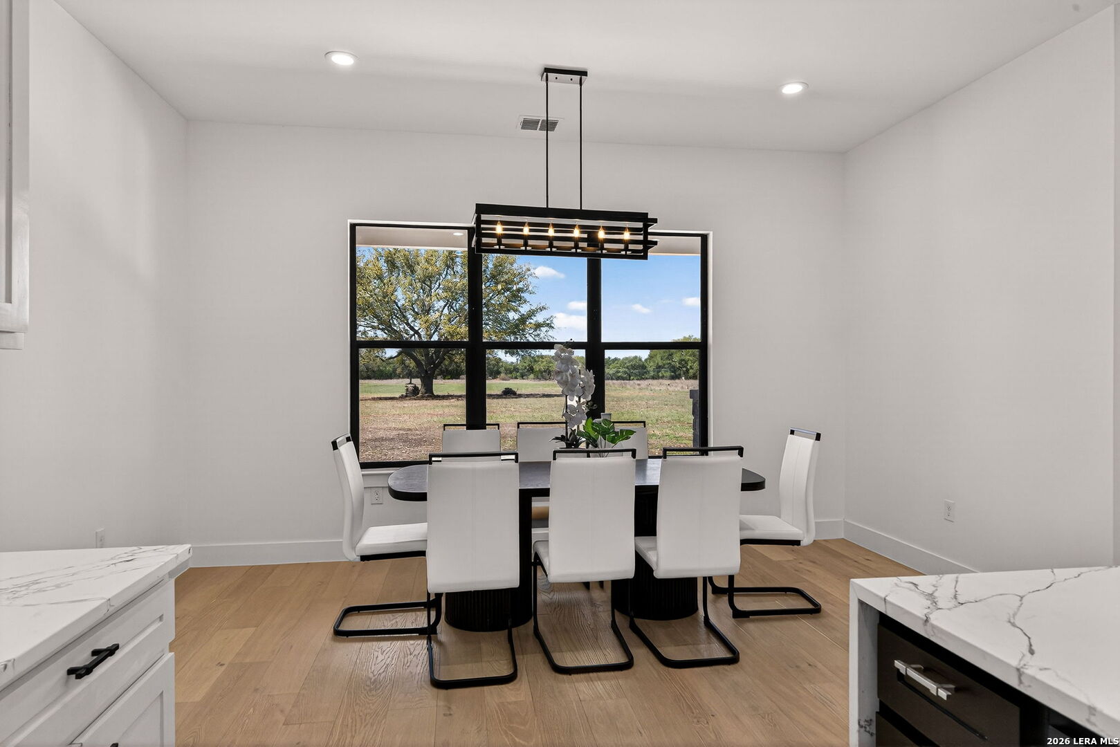 344 Buckskin Trail Bandera, TX 78003 - Photo 15 of 50 a view of a dining room with furniture window and outside view
