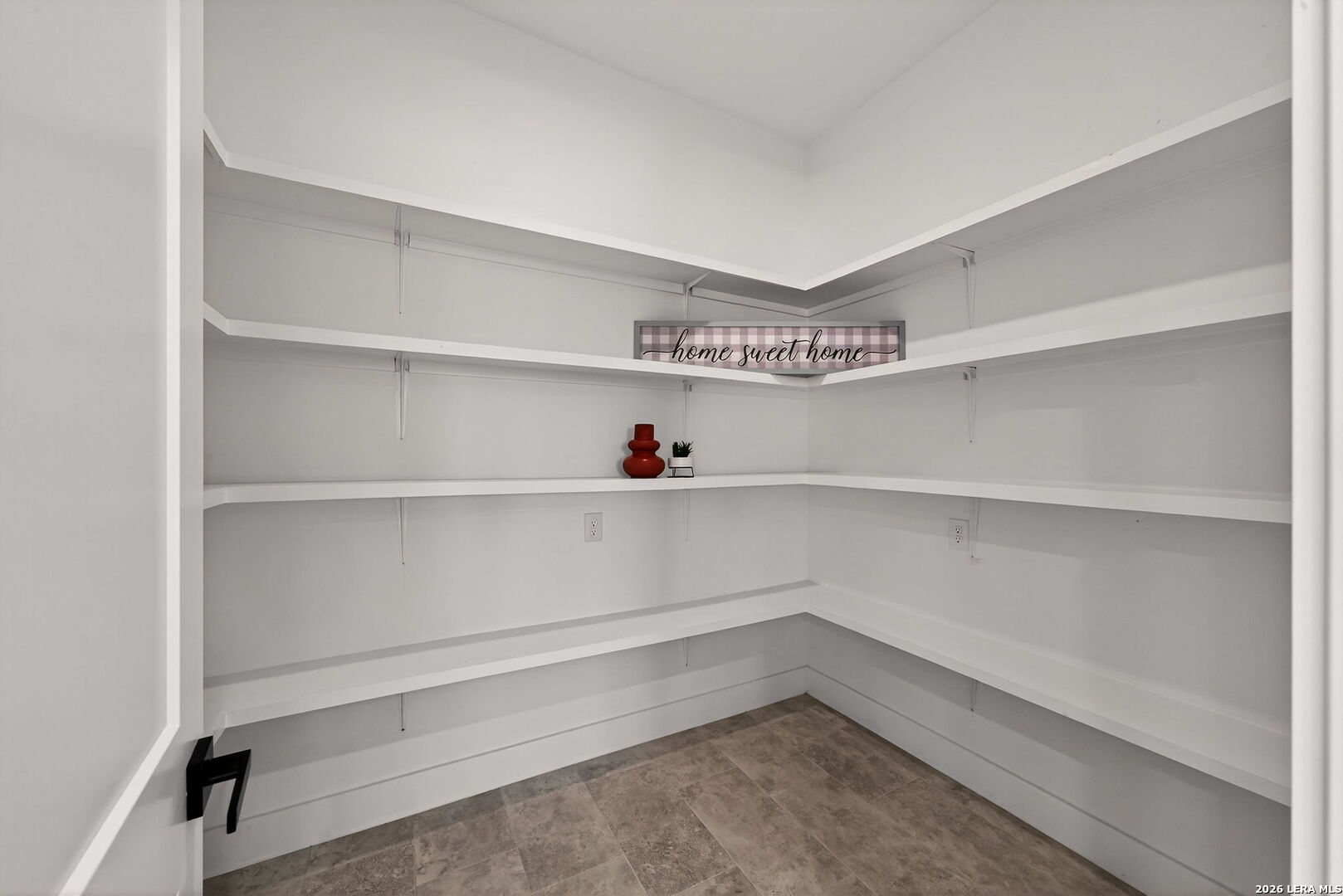 344 Buckskin Trail Bandera, TX 78003 - Photo 17 of 50 a view of walk in closet with empty racks