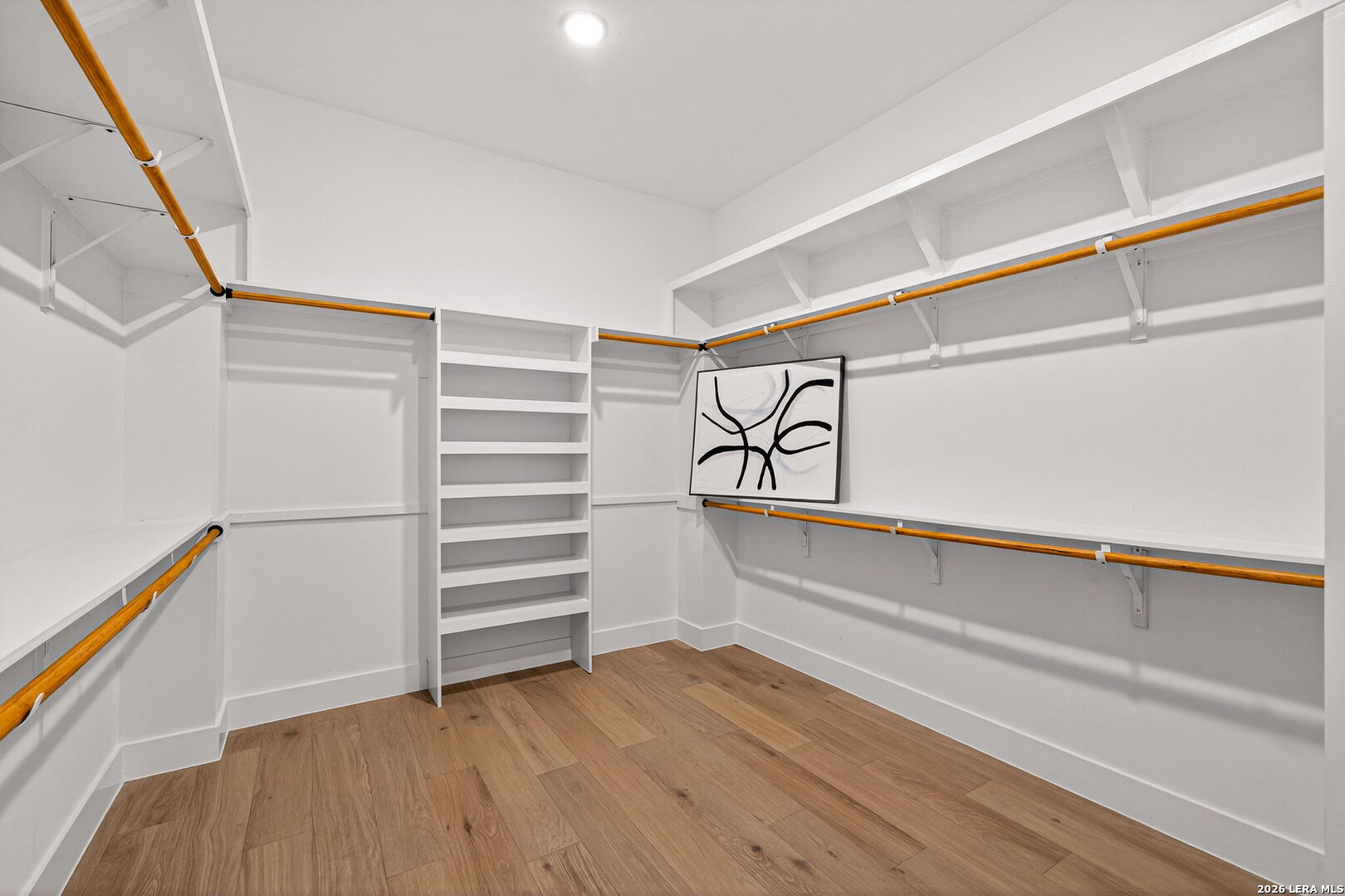 344 Buckskin Trail Bandera, TX 78003 - Photo 27 of 50 a view of walk in closet with stairs