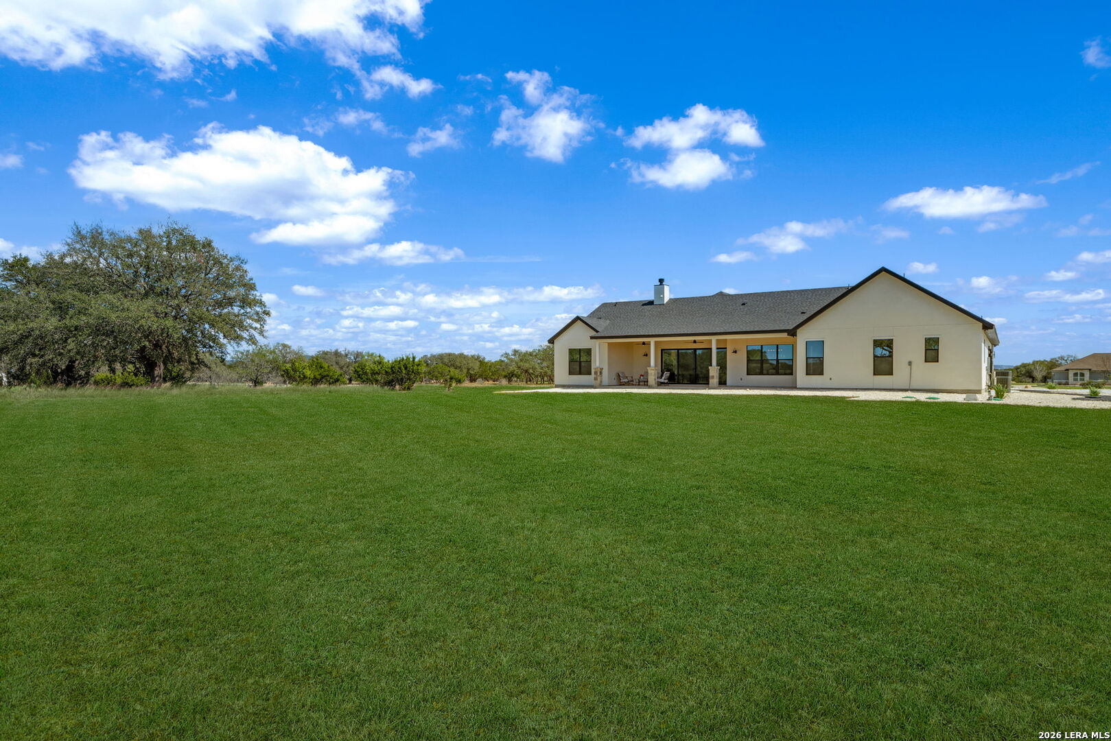 344 Buckskin Trail Bandera, TX 78003 - Photo 40 of 50 a view of house with backyard and entertaining space
