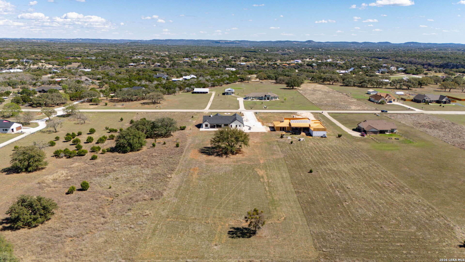 344 Buckskin Trail Bandera, TX 78003 - Photo 42 of 50 an aerial view of residential houses with outdoor space