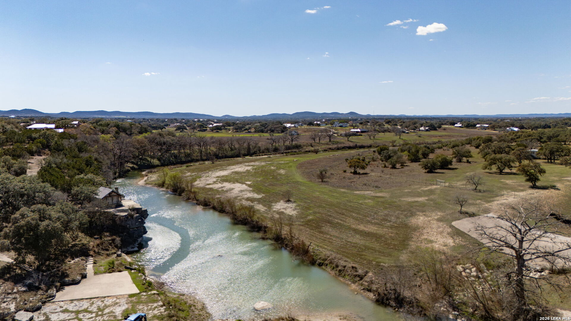 344 Buckskin Trail Bandera, TX 78003 - Photo 45 of 50 a view of lake with mountain