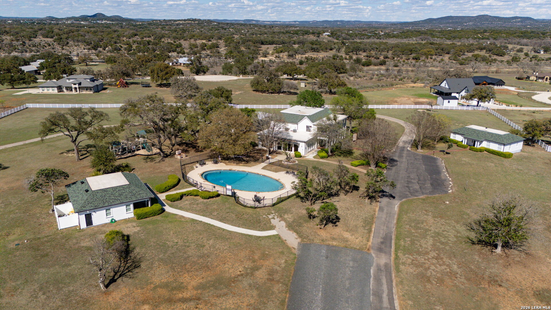 344 Buckskin Trail Bandera, TX 78003 - Photo 49 of 50 an aerial view of residential houses with outdoor space