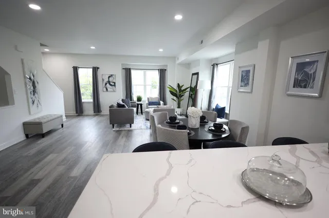 a living room with furniture and a couch