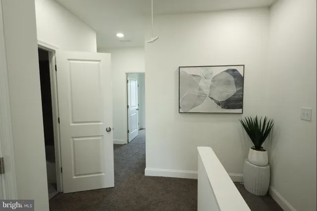 a bedroom with a bed and a mirror