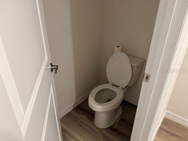 10507 Tucker Road Weeki Wachee, FL 34613 - Photo 32 of 39 a bathroom with a sink and a mirror