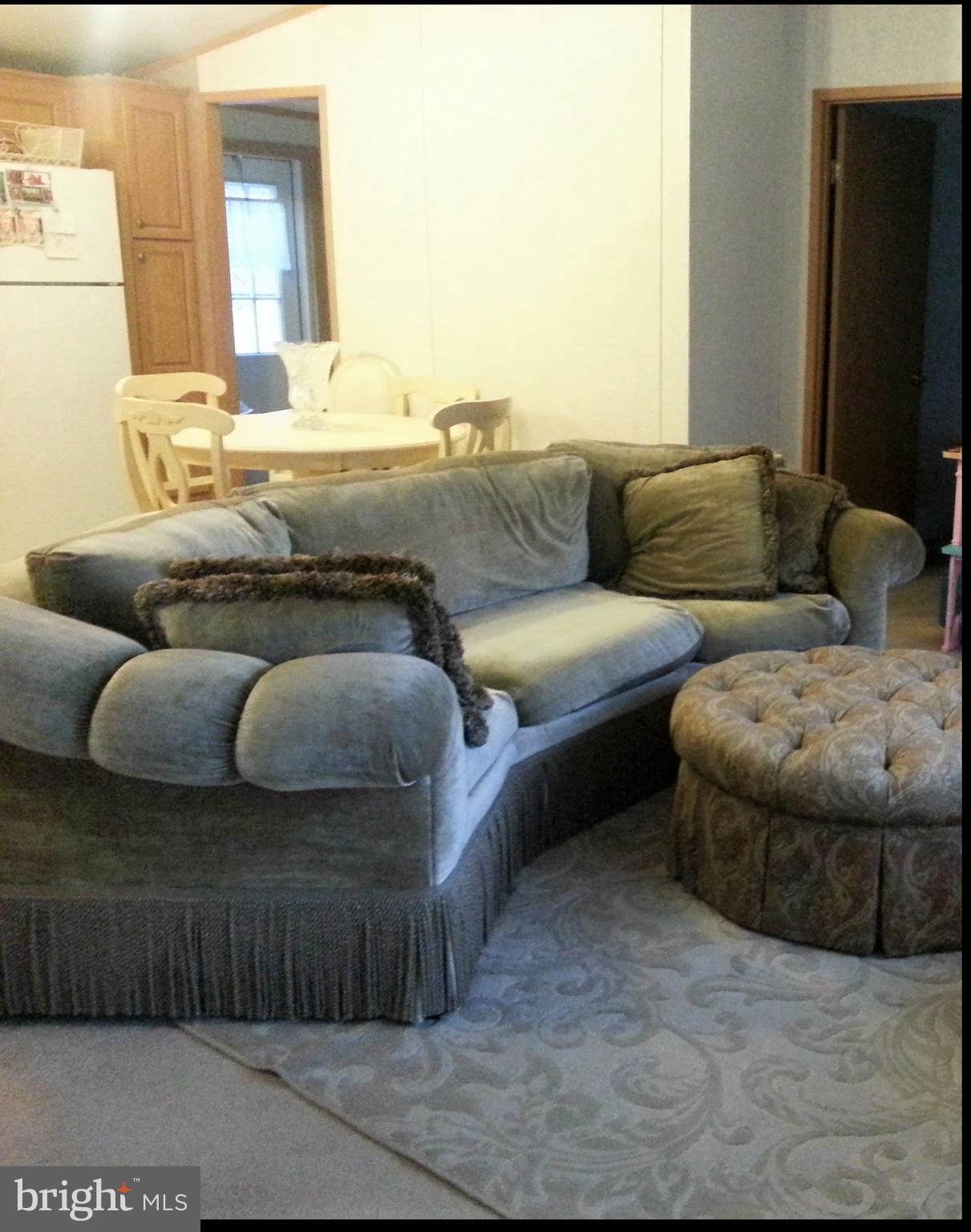 3302 Forge Hill Road Street, MD 21154 - Photo 6 of 7 a living room with furniture and a couch