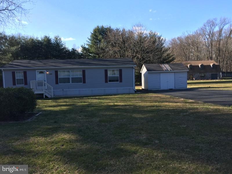 3302 Forge Hill Road Street, MD 21154 - Photo 7 of 7 a view of a house with a yard