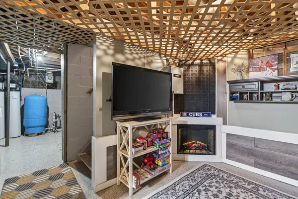 a room with furniture and a flat screen tv