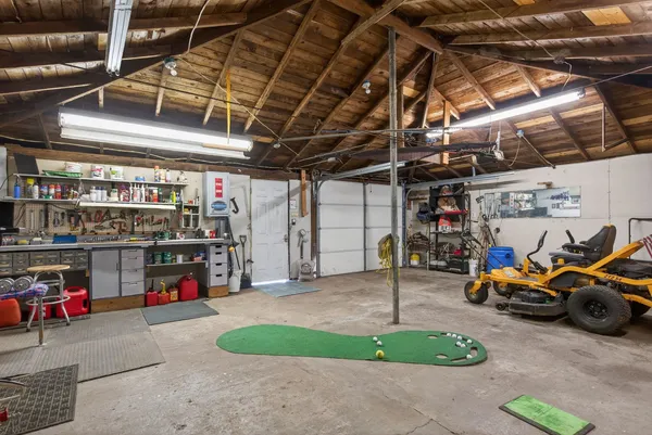 a view of parking garage with cars