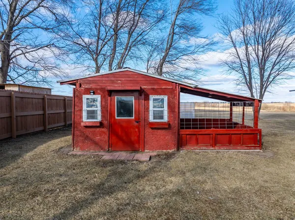 a front view of a house with an empty room