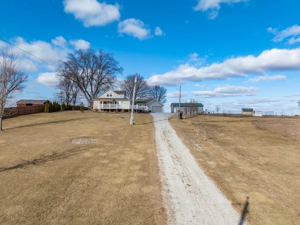 a view of a lake with a yard