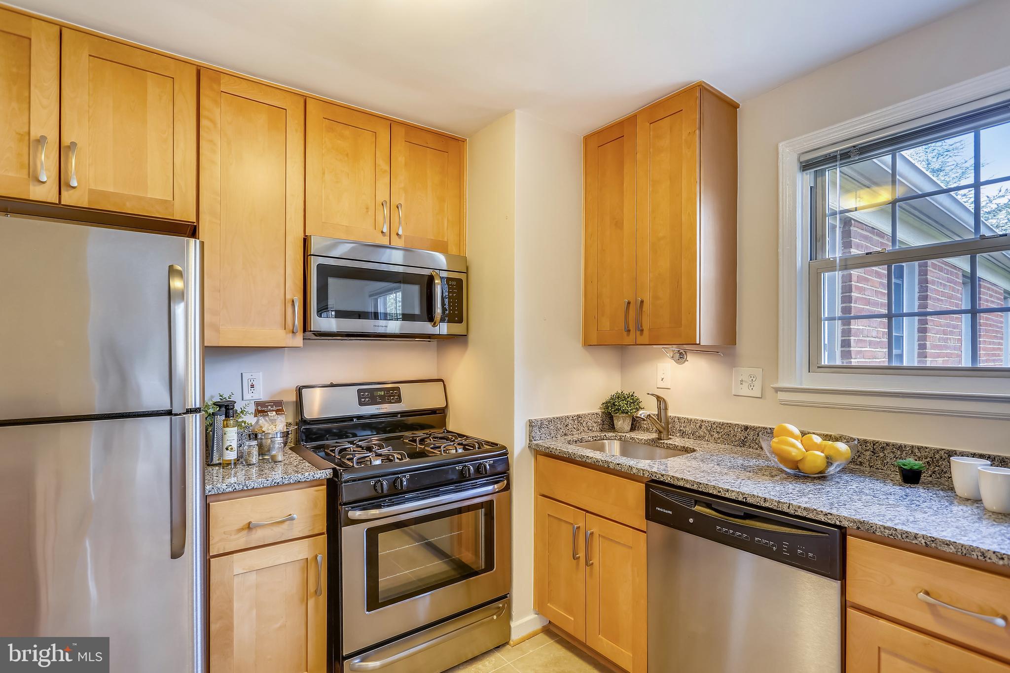 2400 Colston Drive, Unit C202 Silver Spring, MD 20910 - Photo 4 of 24 Updated kitchen with granite and stainless steel