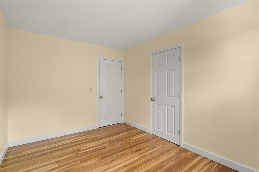 56 Paul Road Holliston, MA 01746 - Photo 14 of 33 a view of a room with wooden floor and white wall