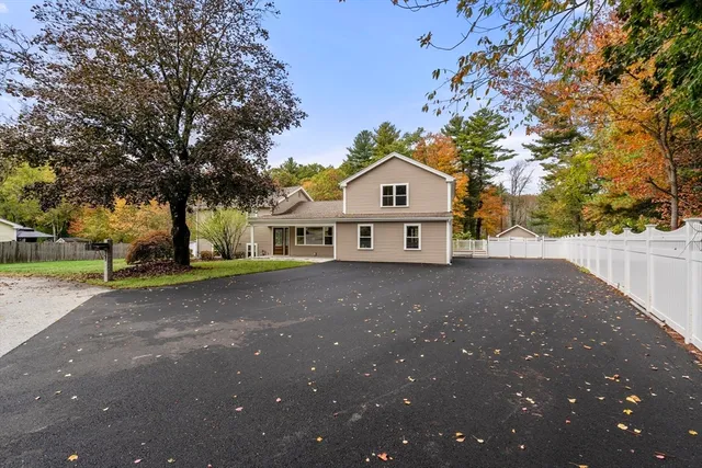 a view of backyard with garden and entertaining space