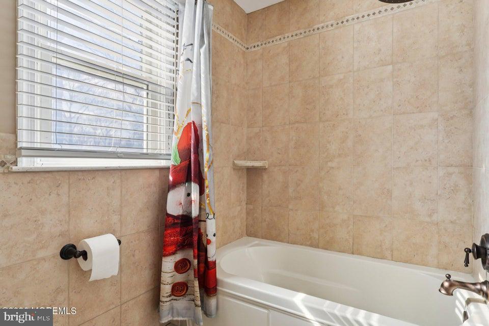 229 Point Pleasant Avenue Bayville, NJ 08721 - Photo 12 of 27 a bathroom with a bathtub and shower