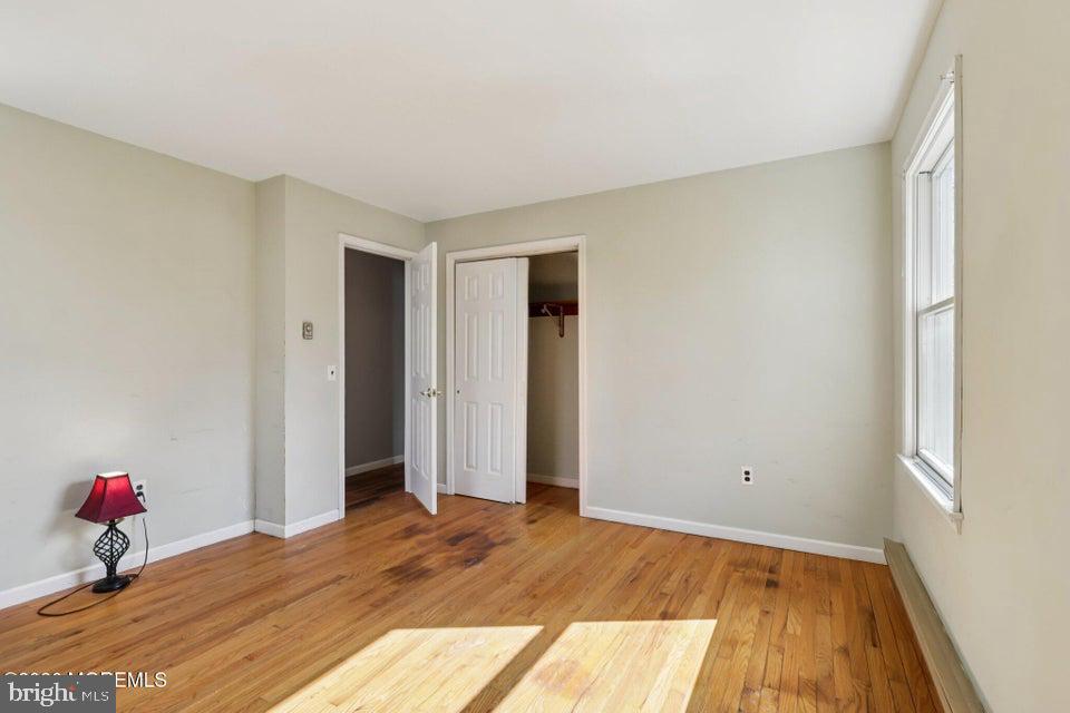 229 Point Pleasant Avenue Bayville, NJ 08721 - Photo 15 of 27 a bedroom with a bed and wooden floor