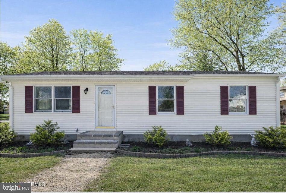 229 Point Pleasant Avenue Bayville, NJ 08721 - Photo 26 of 27 front view of a house with a yard