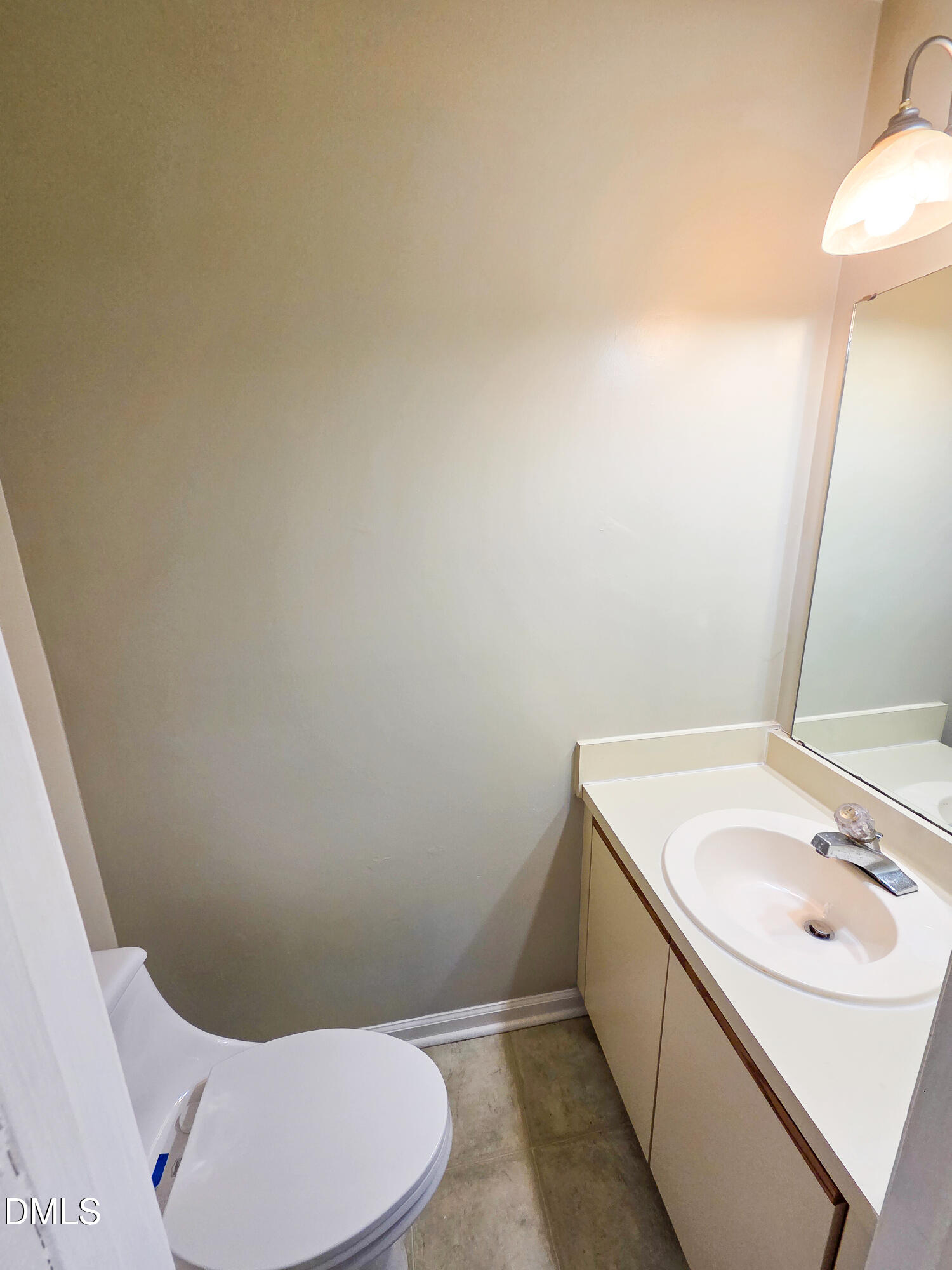 3810 Grey Harbor Drive, Unit 307 Raleigh, NC 27616 - Photo 12 of 25 a bathroom with a sink and a toilet