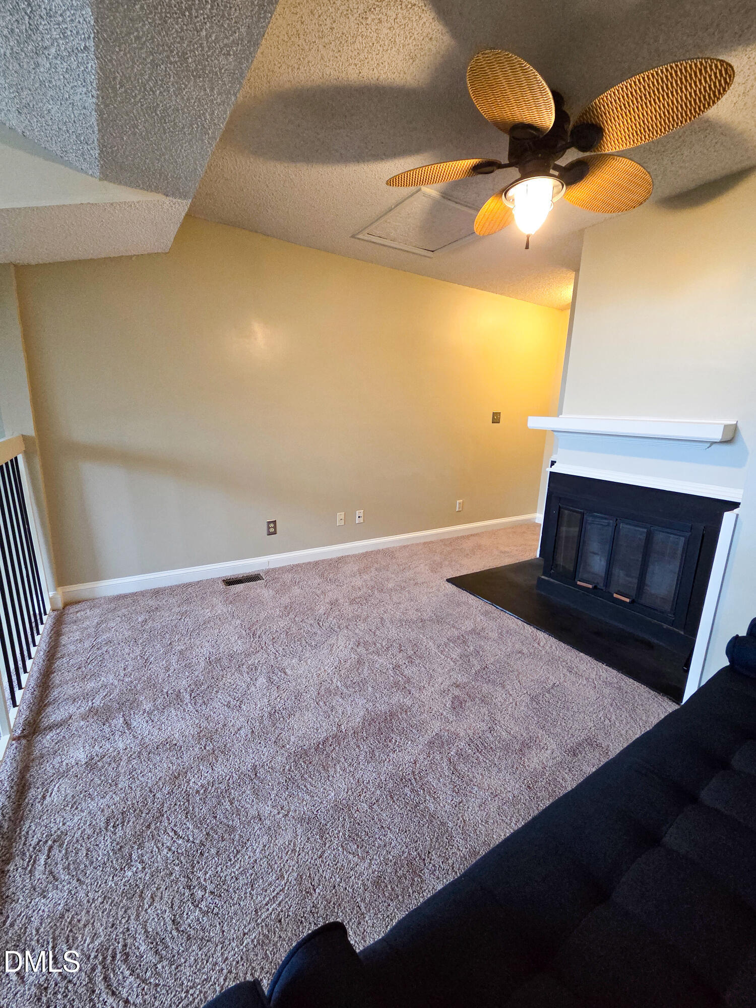 3810 Grey Harbor Drive, Unit 307 Raleigh, NC 27616 - Photo 14 of 25 a view of an empty room and chandelier fan