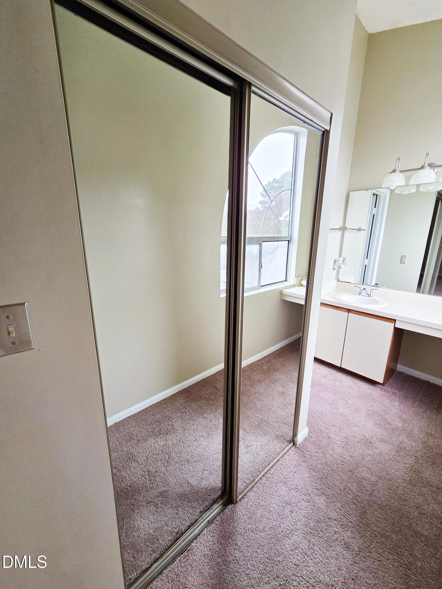 3810 Grey Harbor Drive, Unit 307 Raleigh, NC 27616 - Photo 20 of 25 a view of an empty room with a window