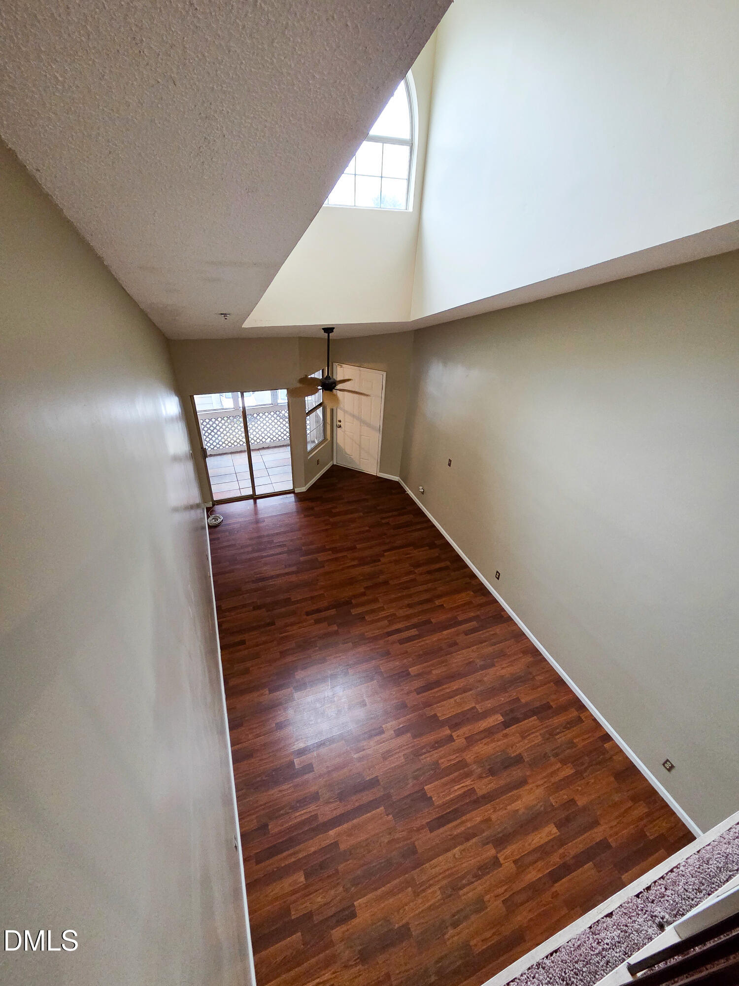 3810 Grey Harbor Drive, Unit 307 Raleigh, NC 27616 - Photo 4 of 25 a view of an empty room with wooden floor