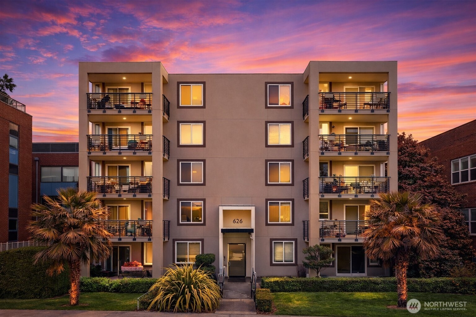 626 4th Avenue West, Unit 104 Seattle, WA 98119 - Photo 1 of 37 a front view of a multi story building