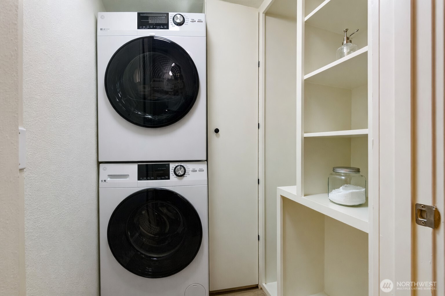 626 4th Avenue West, Unit 104 Seattle, WA 98119 - Photo 20 of 37 a utility room with dryer and washer
