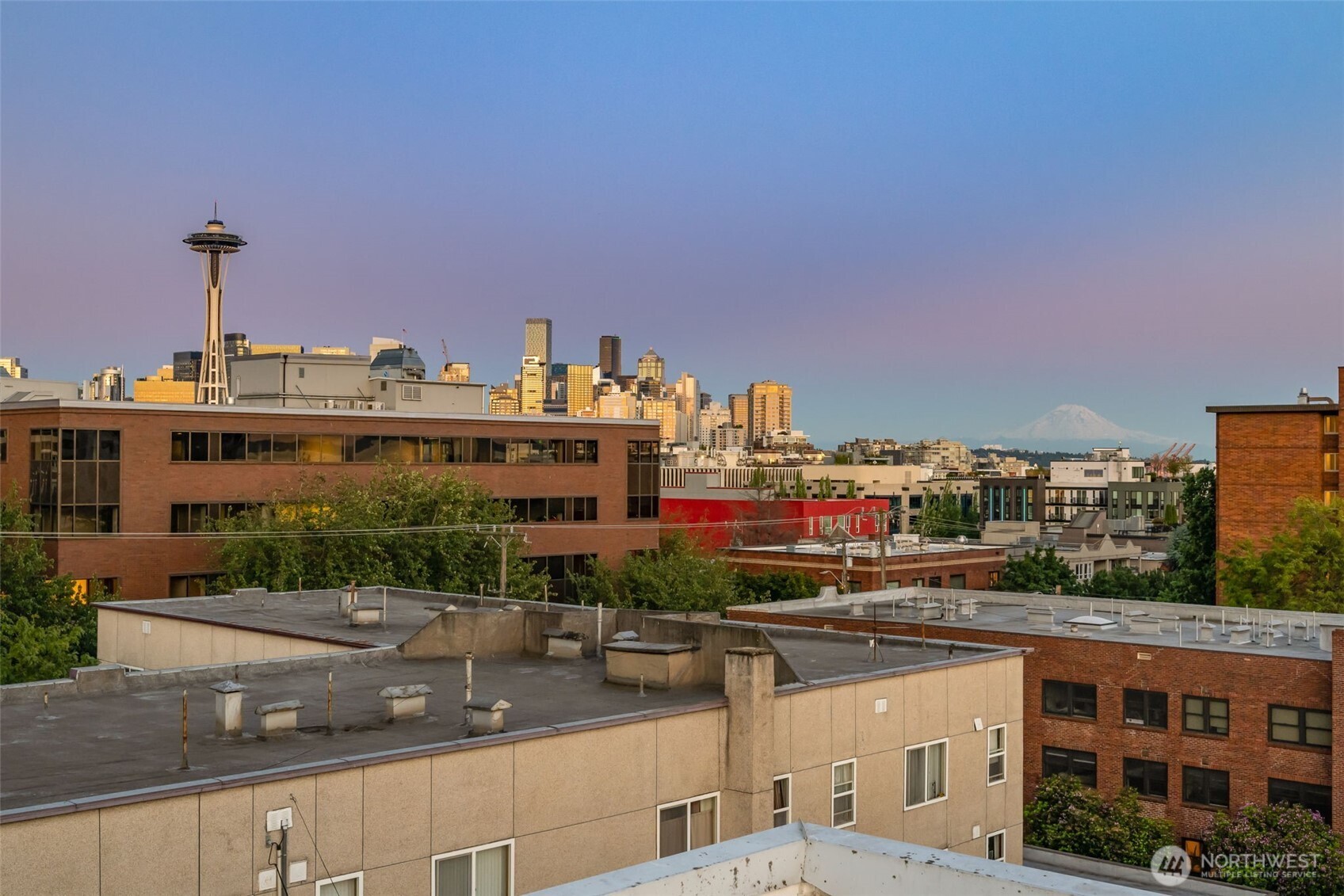 626 4th Avenue West, Unit 104 Seattle, WA 98119 - Photo 2 of 37 a view of city with tall buildings
