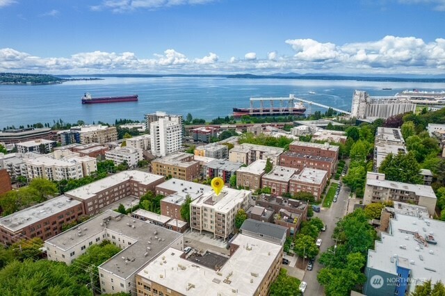 626 4th Avenue West, Unit 104 Seattle, WA 98119 - Photo 27 of 37 a view of a city with ocean