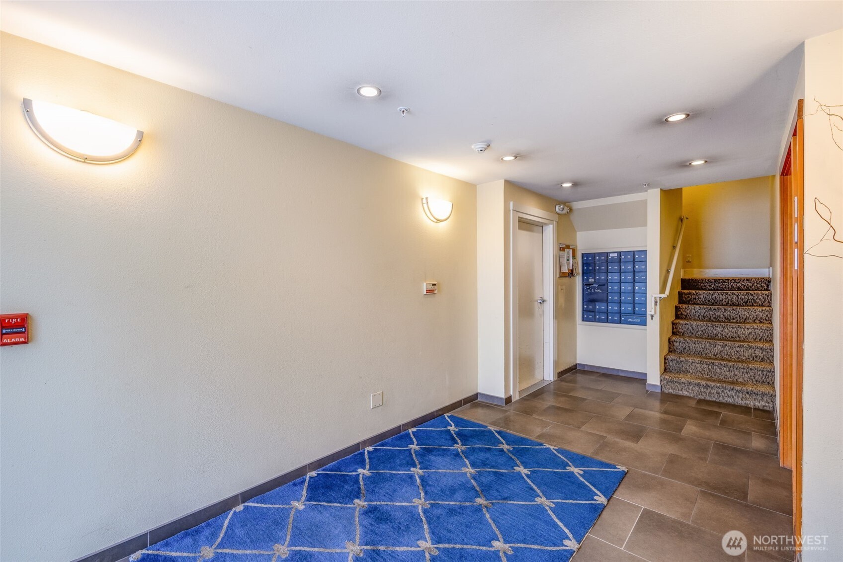 626 4th Avenue West, Unit 104 Seattle, WA 98119 - Photo 4 of 37 a view of a hallway with closet