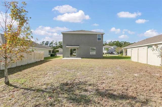 a view of backyard of house
