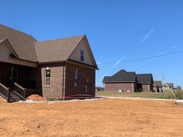 3249 Midland Road Bell Buckle, TN 37020 - Photo 3 of 12 a house view with a outdoor space