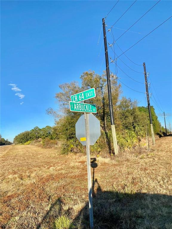 6070 East Arbuckle Road Avon Park, FL 33825 - Photo 5 of 5 a view of a yard with an ocean view